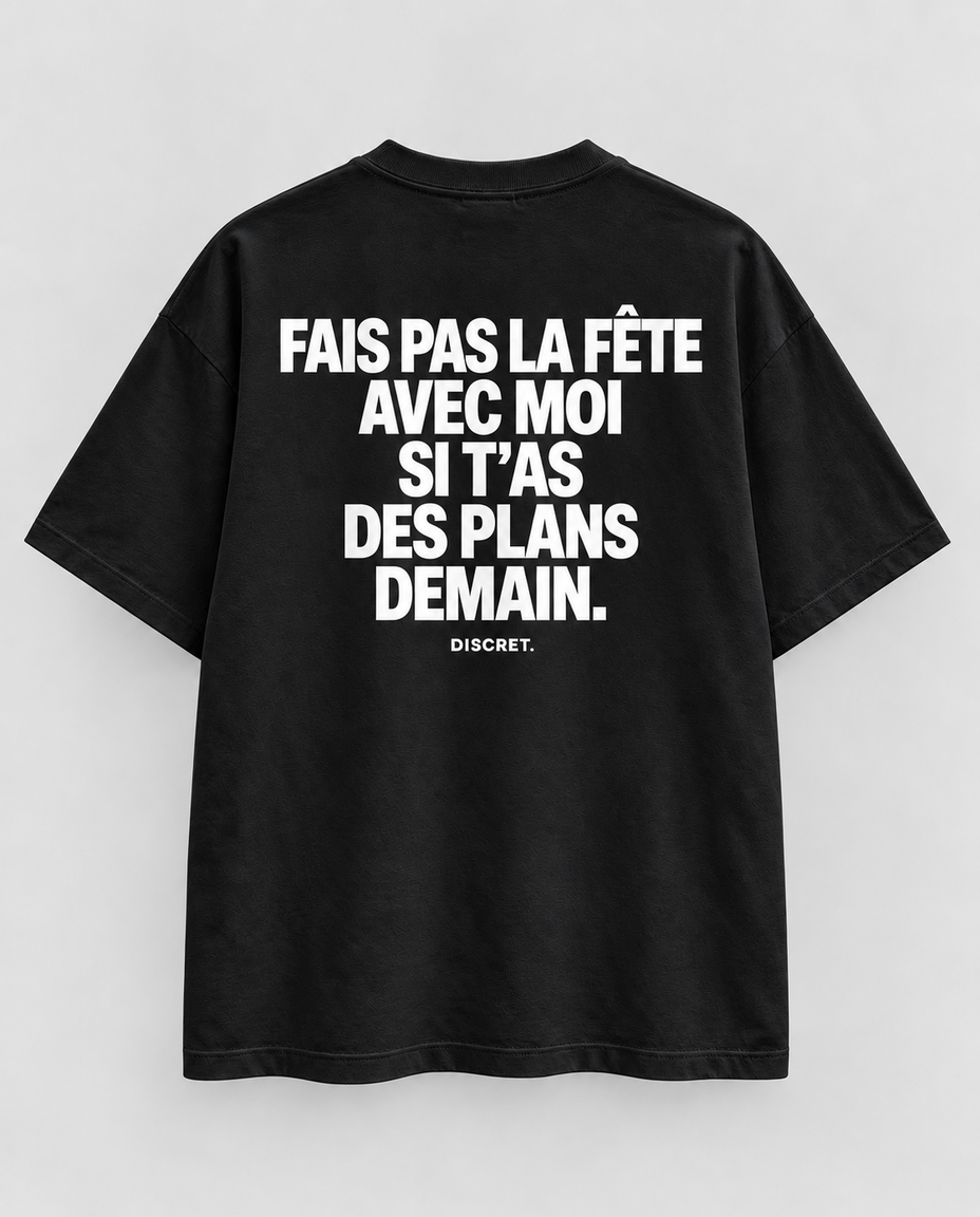 T-shirt noir DISCRET. Fais pas la fête avec moi — imprimé blanc au dos