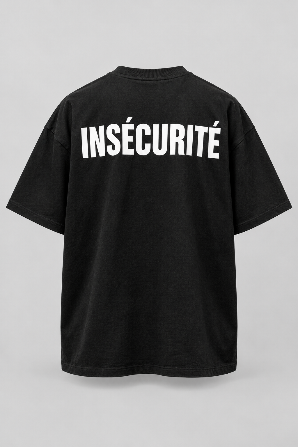 T-shirt noir INSÉCURITÉ DISCRET. — inscription blanche au dos